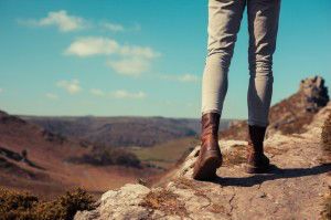 Young woman walking in the mountains