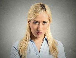 Headshot pissed off, angry, grumpy, young woman