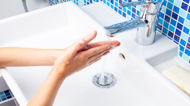 Child washing hands