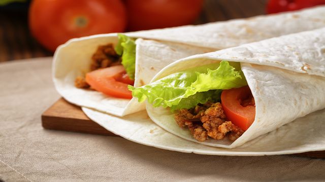 burritos with beef tomato and salad leaf