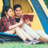 Enjoy a vacation at home with a tent and a couple of good books